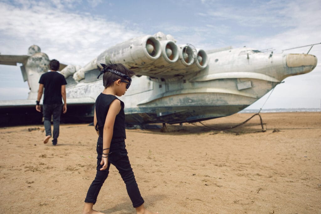 father and son rockers in black clothes walk along 2024 10 18 03 25 23 utc - kolej idea